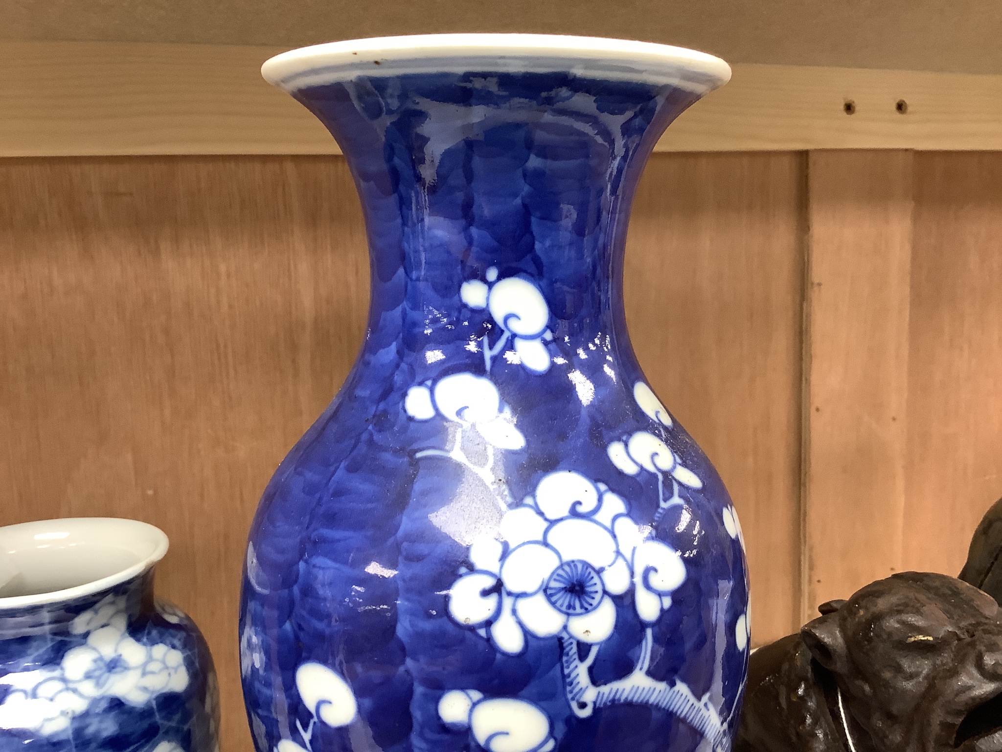 A pair of late 19th century Chinese prunus blossom baluster vases, 30cm, and a Japanese ovoid vase